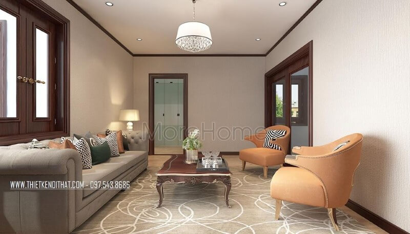 Thiết kế nội thất sofa khung gỗ sồi nhập khẩu bọc vải màu sữa kết hợp chiếc bàn trà bằng gỗ tự nhiên mài nâu socola, cùng với 2 chiếc ghế nghỉ màu cam tạo sự sinh động mà không bị chật chội. Mẫu sofa gỗ sang trọng