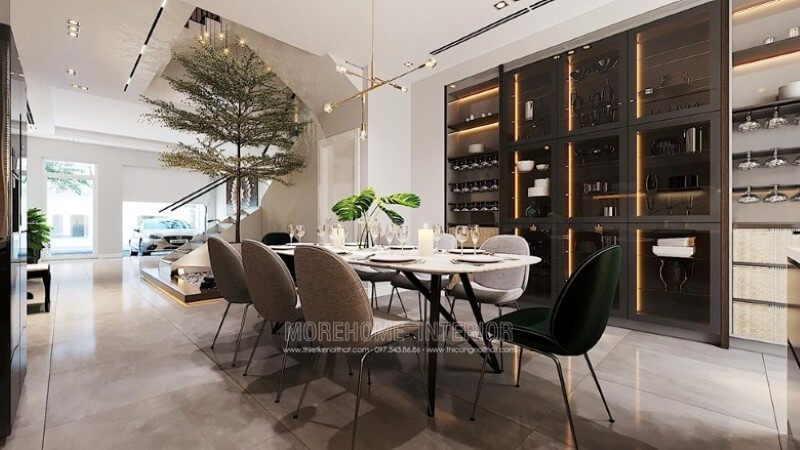Bộ bàn ghế ăn hiện đại đ���p với 6 chiếc ghế ăn bọc vải màu ghi xám, 2 chiếc ghế ăn bọc vải màu xanh coban ấn tượng - kiểu dáng tinh tế lai nhẹ nhàng, chiếc bàn ăn chân gỗ tự nhiên mặt bàn đá nhân tạo vân mây cao cấp. Kết nối khu vực phòng bếp với phòng ăn thêm hài hòa và khoa học.
